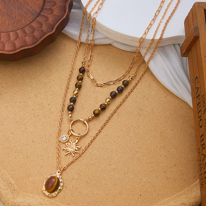 Layered tiger eye sun pendant necklace, view 2